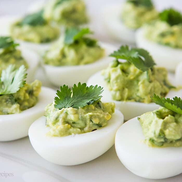 Guacamole pimento studded deviled eggs Guacamole pimento studded deviled eggs