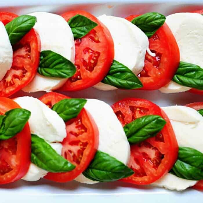Mozzarella and Tomatoes with basil Mozzarella and Tomatoes with basil