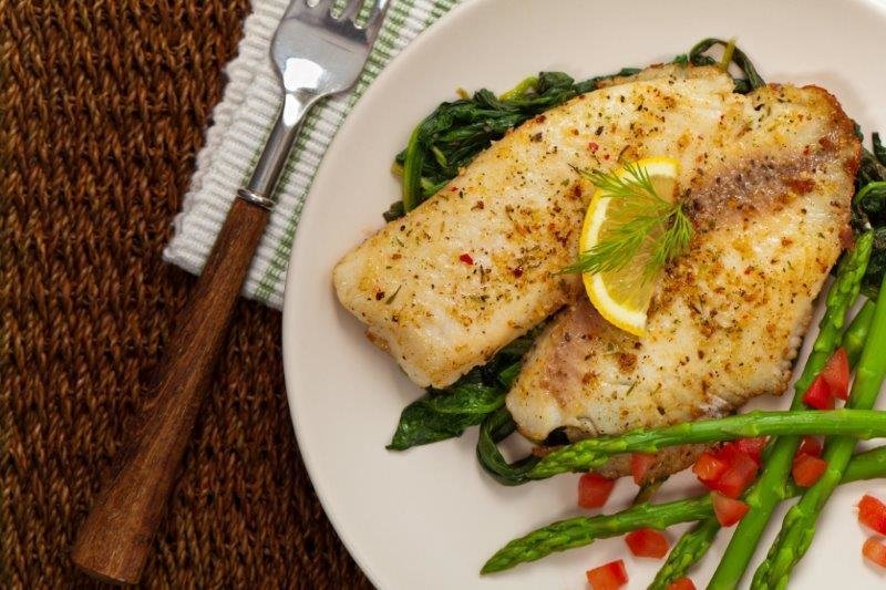 Fish Fillets Served with Short Grain Brown Rice. Kale Salad Fish Fillets Served with Short Grain Brown Rice. Kale Salad