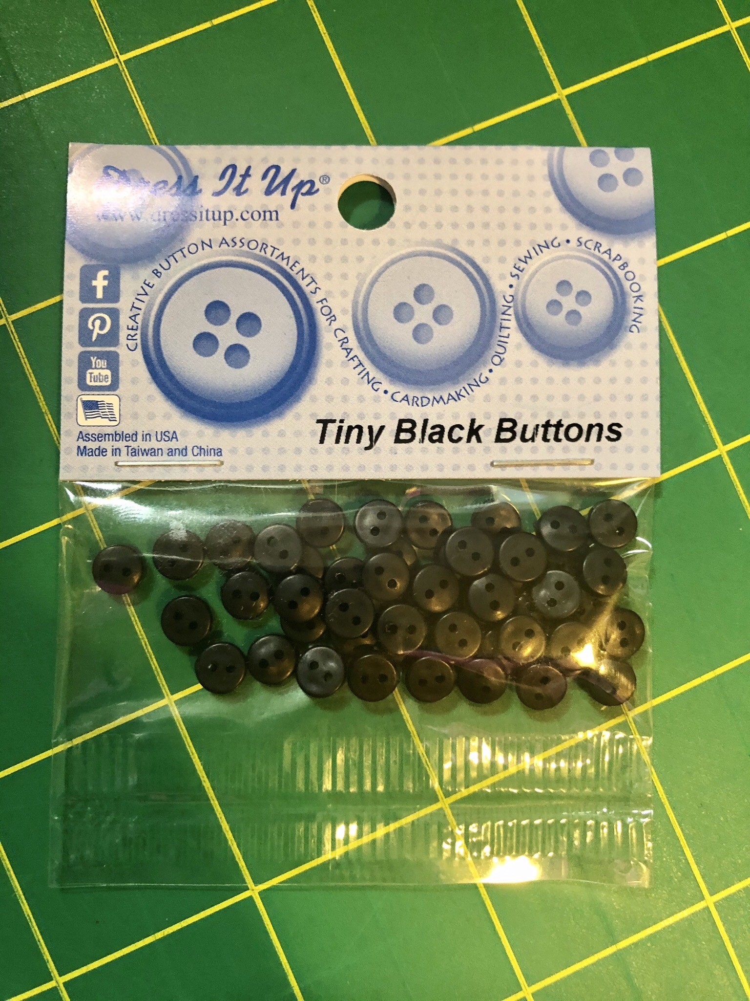 Tiny Black Buttons 55730