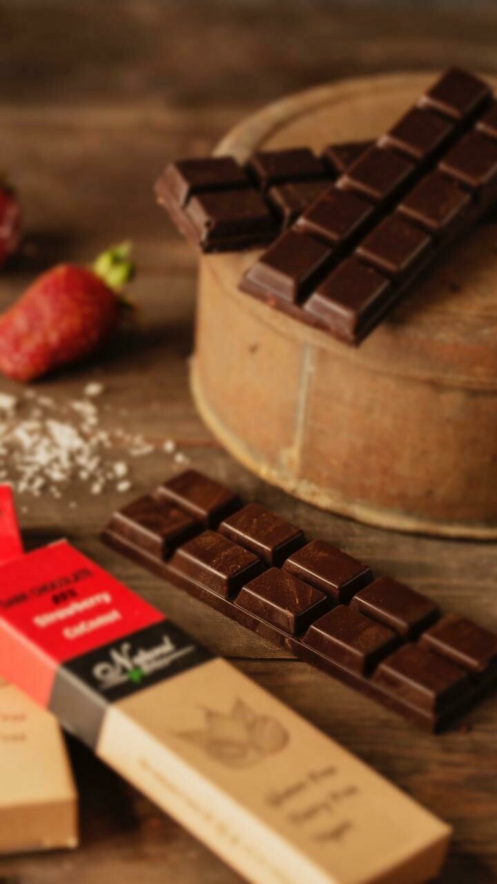 85% Dark chocolate with coconut and strawberry شيكولاته دارك بالفرواله و جوز الهند 85% Dark chocolate with coconut and strawberry شيكولاته دارك بالفرواله و جوز الهند