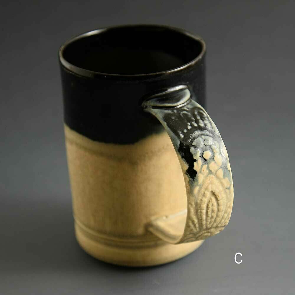 Mug - Dark top mug with lace-patterend handle detail. Porcelain Mug - Dark top mug with lace-patterend handle detail. Porcelain