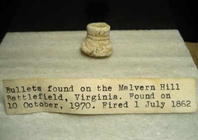 JUST ADDED ON 4/29 - THE BATTLE OF MALVERN HILL / SEVEN DAYS BATTLES - Nice Partially Mushroomed Confederate Gardner Bullet with Original Collection Label JUST ADDED ON 4/29 - THE BATTLE OF MALVERN HILL / SEVEN DAYS BATTLES - Nice Partially Mushroomed Confederate Gardner Bullet with Original Collection Label
