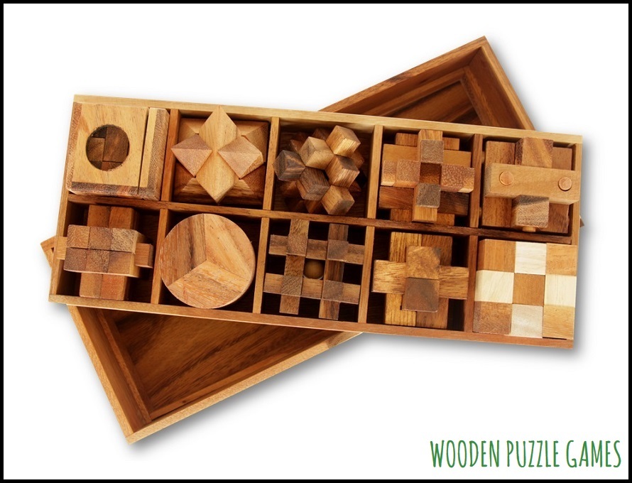 Set of 10 Puzzles in a wooden Box