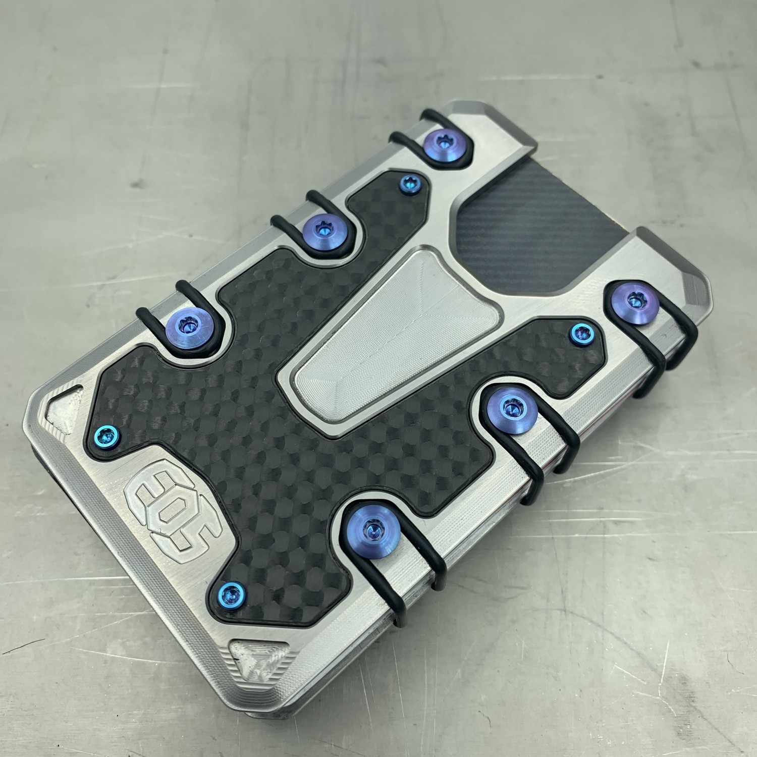 Carbon Fiber Vs Titanium Wallet IUCN Water