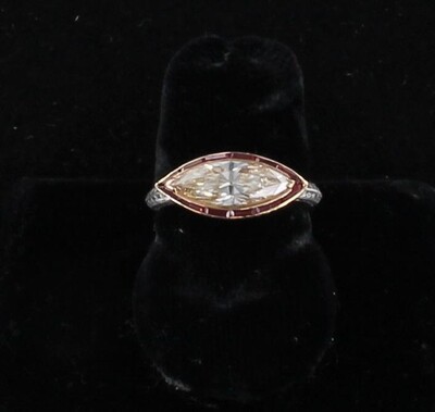 18KT 1.15 CT MARQUISE DIAMOND AND RUBY RING 18KT 1.15 CT MARQUISE DIAMOND AND RUBY RING