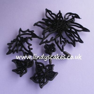 Poinsettia, Holly and Ivy Cutter and Embossing Set (Patchwork Cutters) Poinsettia, Holly and Ivy Cutter and Embossing Set (Patchwork Cutters)